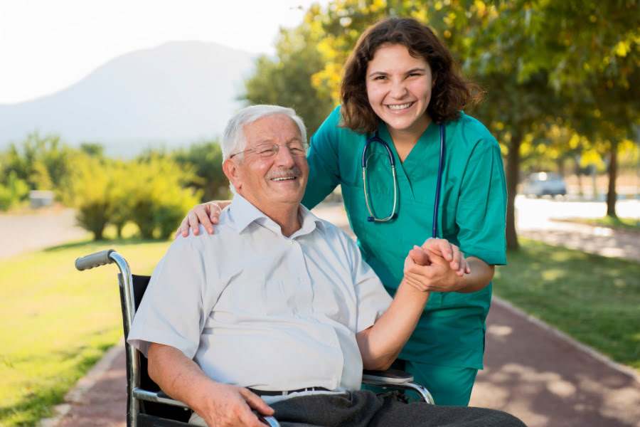 caregiver-with-elderly-man-on-wh